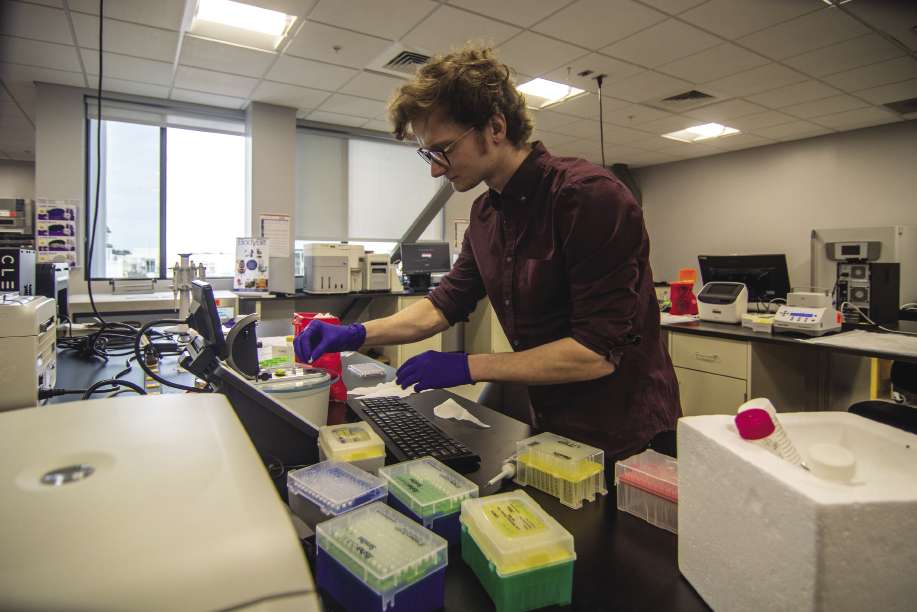 Drew Croke performs research at the ABI-LAB incubator in Natick.
