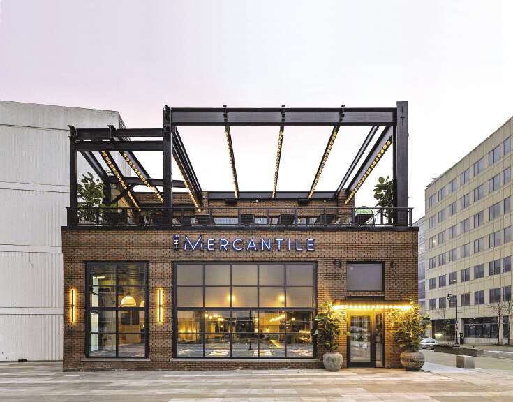 A two-story modern brick restaurant building