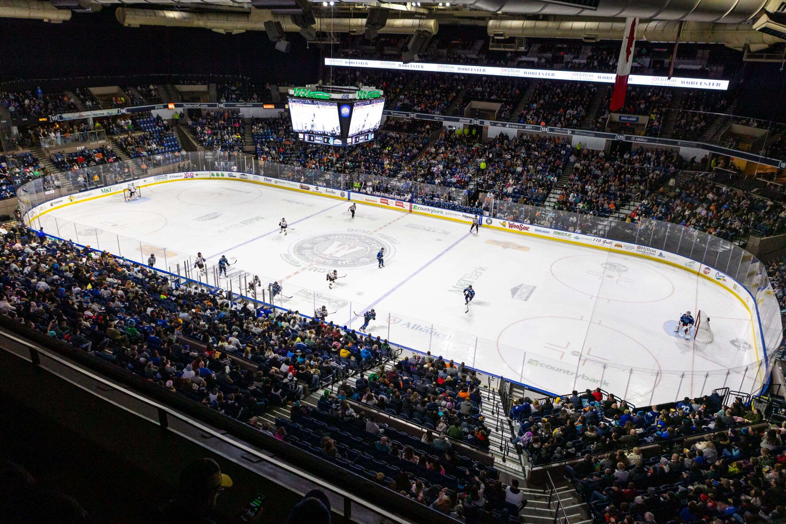 A hockey game in a mid-sized arena