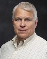 Man in white-plaid dress shirt