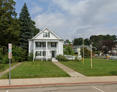 A two-story white home