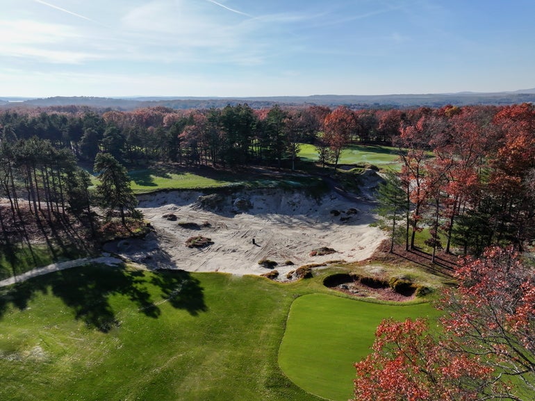 a large excavation site in a golf course