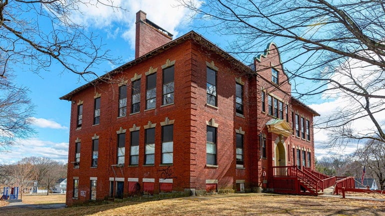 A two-story brick schhoolhouse building