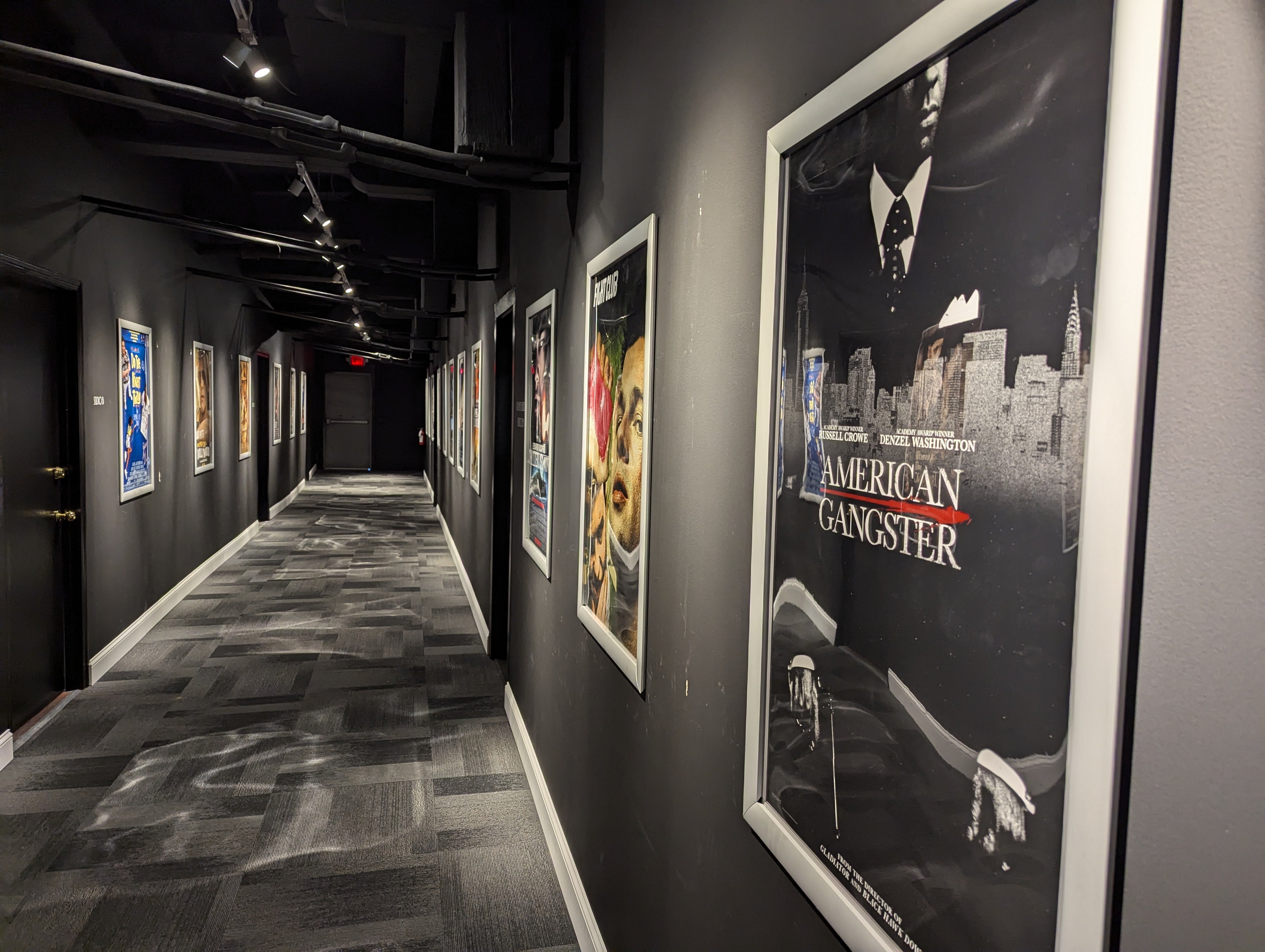 A hallway with movie posters